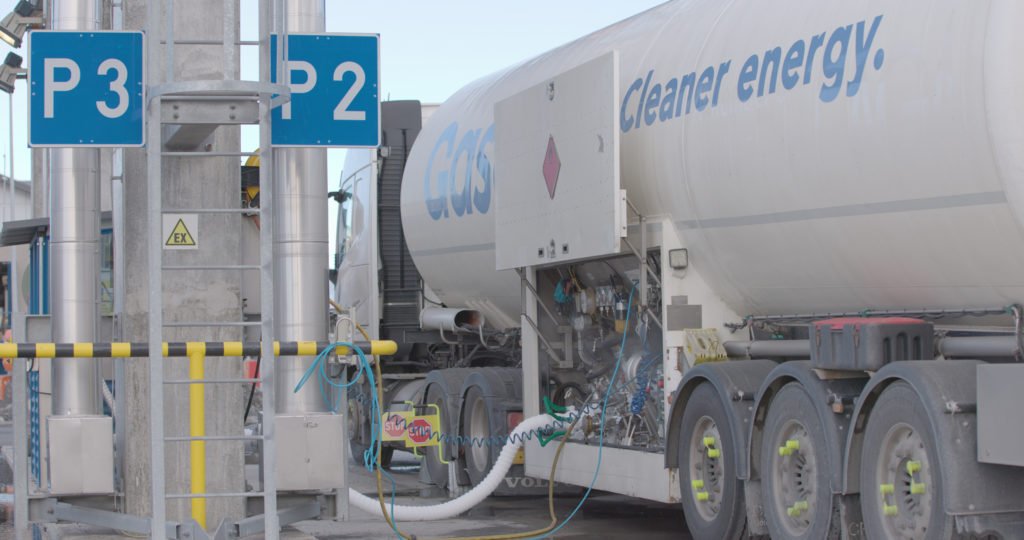 Truck loading in Manga LNG terminal where Valmet's IOP is used.